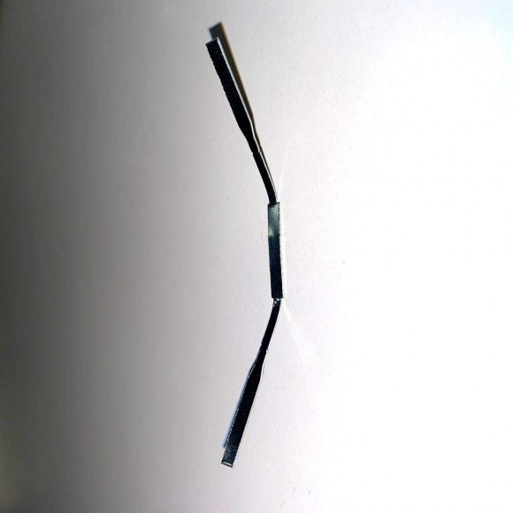 Пружина (крепление) для микроплинтуса